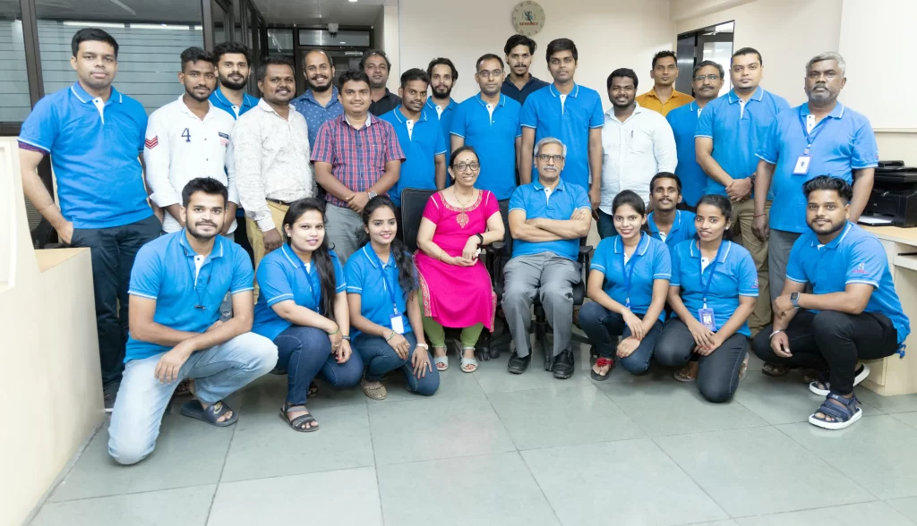 senergy team picture with most of the team in blue shirts